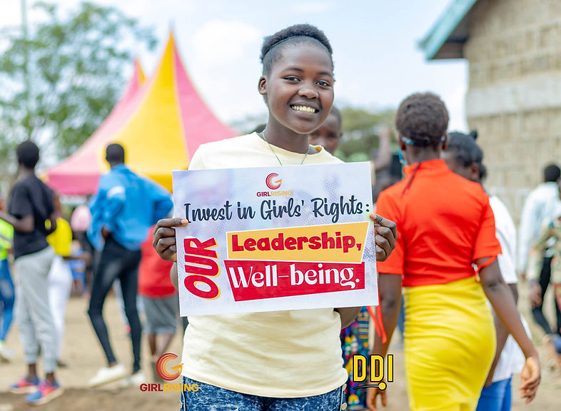 6 Kenya IDG holding sign (5) (1) (1) (1).jpg